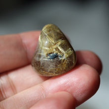 Load image into Gallery viewer, Rutilated Quartz tumbles to focus light